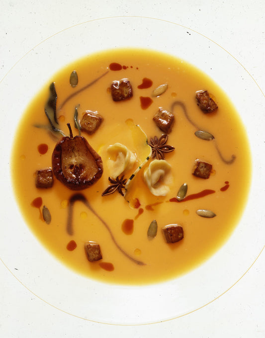 Delicata Squash And Granny Smith Apple Soup With Foie Gras Tortellini, Toasted Pumpkin Seeds, And Chestnut Cream